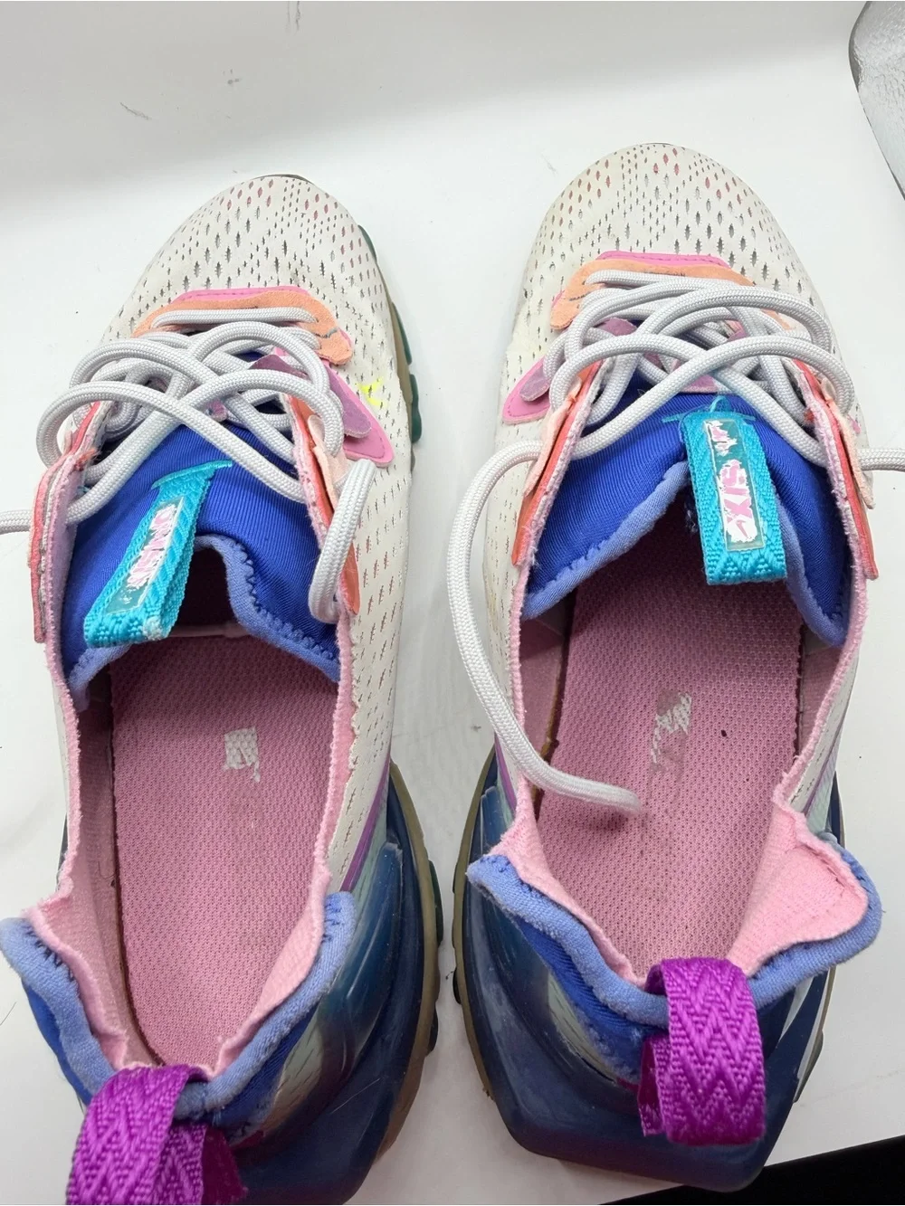 Nike Cream Sneakers with Pink, Purple, Blue and Tan Accents